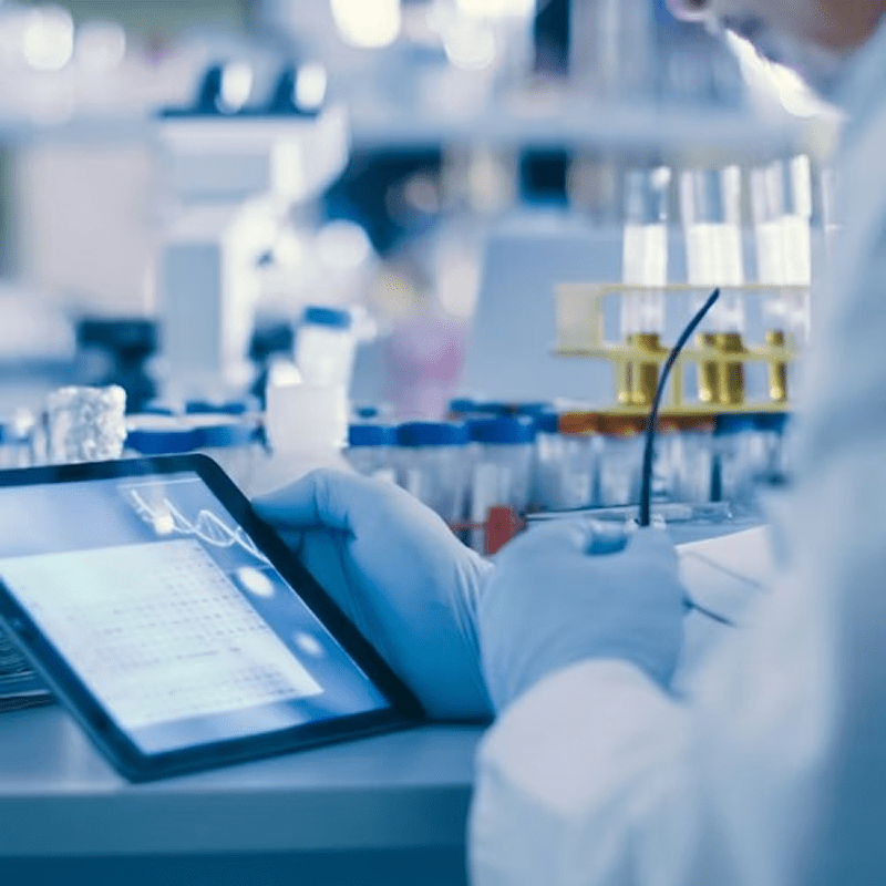 Scientist using tablet in laboratory